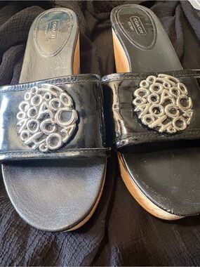 Coach Black Patent Leather Slide Mules with Silver Logo Medallions